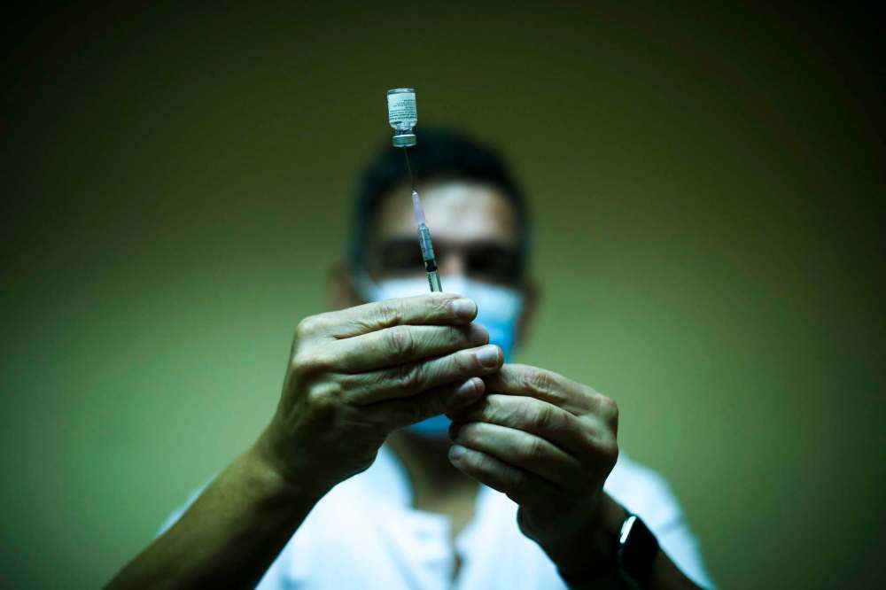 It may seem as if Calgary-based Providence Therapeutics has burst onto the COVID vaccine scene out of nowhere, but it has been working on mRNA vaccines for cancer since it was founded in 2015, and it started working on a COVID-19 vaccine in March.
(AP FILE/Francisco Seco)