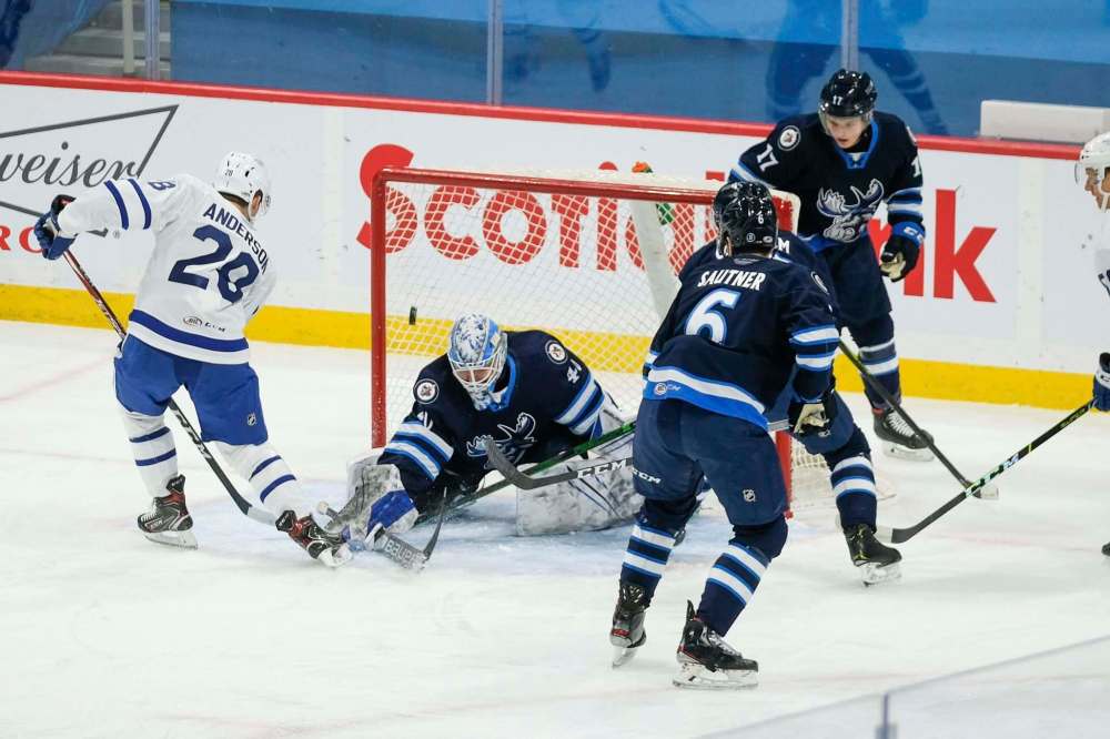 photos by Daniel Crump / Winnipeg Free Press
Manitoba Moose goalie Mikhail Berdin denies Toronto Marlies’ Joey Anderson at Bell MTS Place Monday night. Anderson did put one past Berdin later in the game.