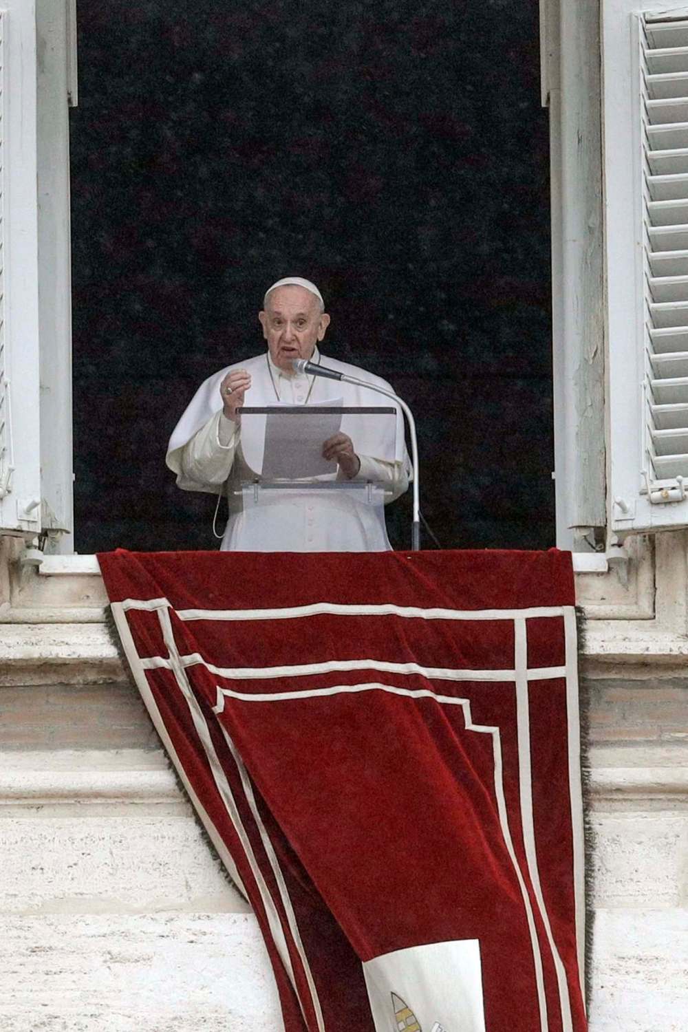 Gregorio Borgia / The Associated Press
Pope Francis recites the Angelus prayer from his Vatican studio window on Feb. 7.