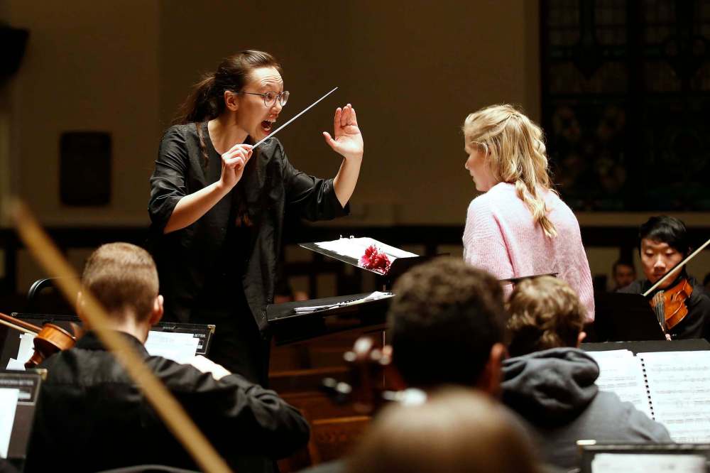 JOHN WOODS / WINNIPEG FREE PRESS Naomi Woo, the new assistant conductor with the Winnipeg Symphony Orchestra, rehearses with the University of Manitoba’s symphony at Westminster Church in Winnipeg Wednesday, November 27, 2019. Reporter: Wasney