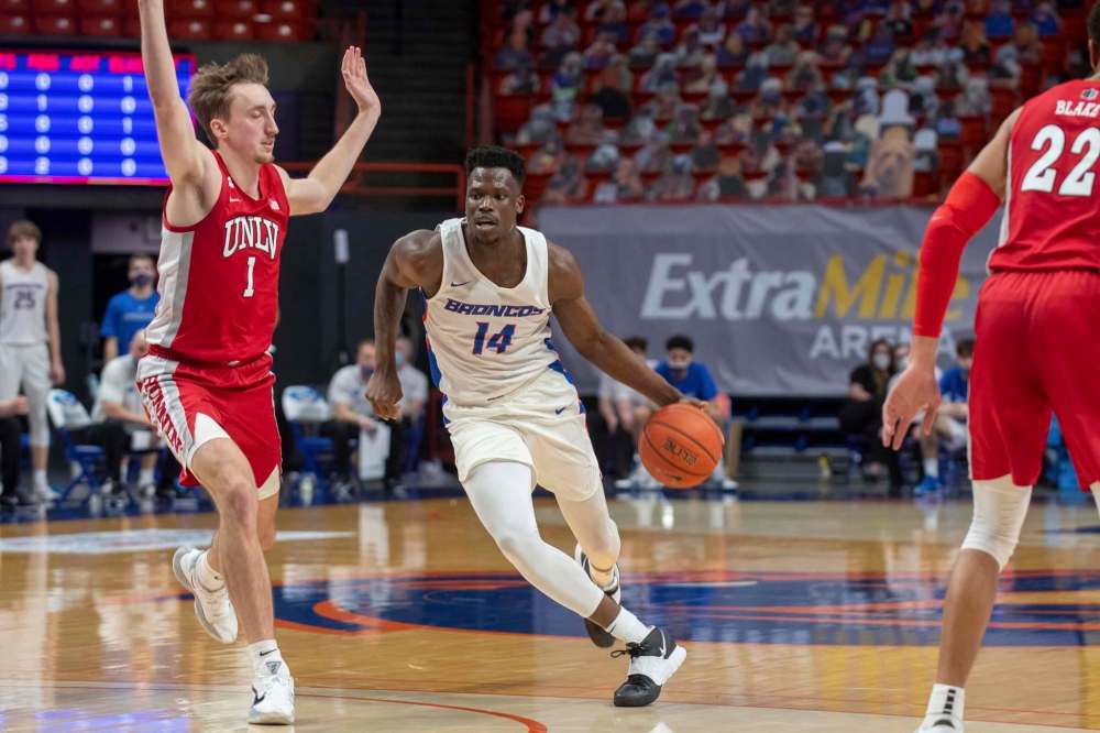 Hue Herrick / Boise State University
Midway through the 2018-19 season, Emmanuel Akot (14) announced he had transferred to the Boise State Broncos.
