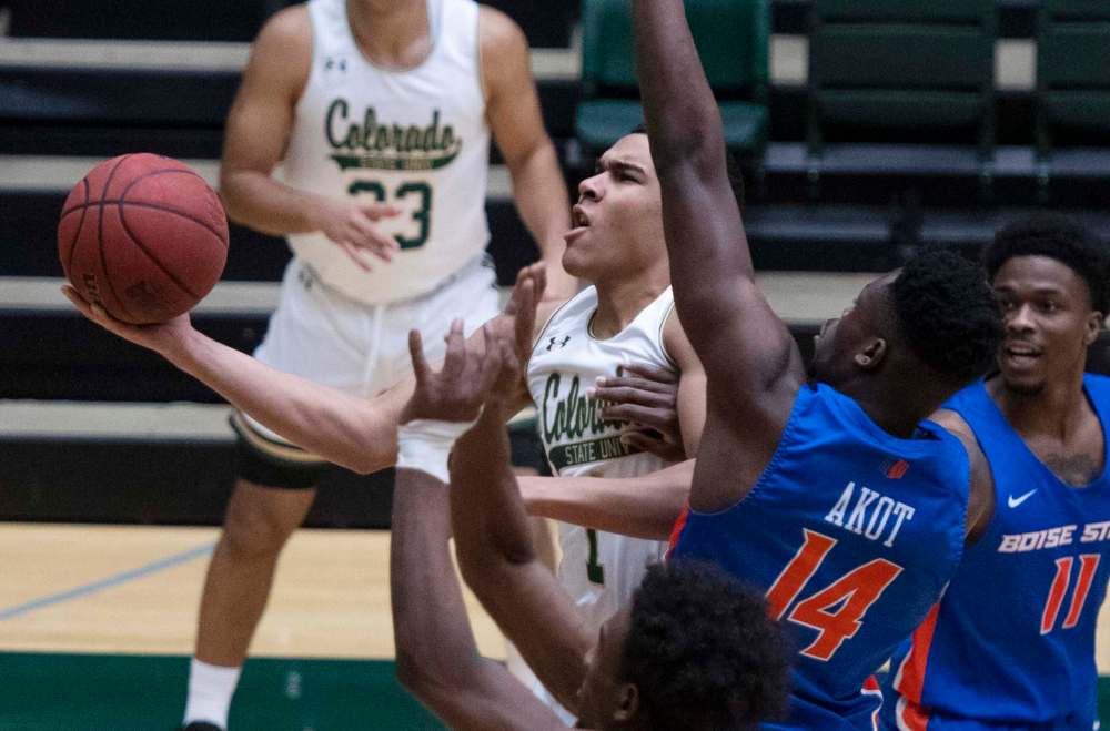 Bethany Baker / The Coloradoan / Associated Press files
Colorado State guard John Tonje shoots as Akot defends during the first half of an NCAA college basketball game in Fort Collins, Colo. last month.