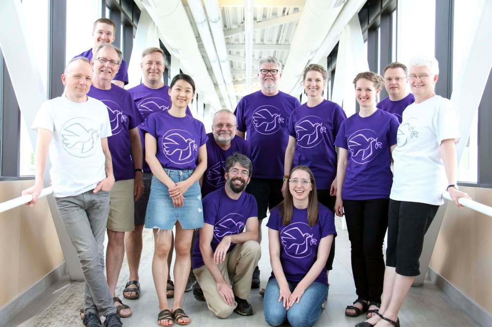 Manitobans Paul Dueck, second from left, and Darryl Neustaedter Barg, third from left, are part of the Mennonite Song and Worship Committee. (Supplied)