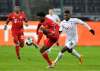 Martin Meissner, Pool / The Associated Press
Bayern's Alphonso Davies, right, controls the ball in front of Moenchengladbach's Breel Embolo, left, during the German Bundesliga soccer match between Borussia Moenchengladbach and Bayern Munich.