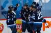 Winnipeg Jets' players celebrate Kyle Connor's goal against the Montreal Canadiens on February 25. Despite the second-best record in the NHL's North division at 14-7-1, the Jets' underlying numbers suggest tougher times await the club. THE CANADIAN PRESS/John Woods