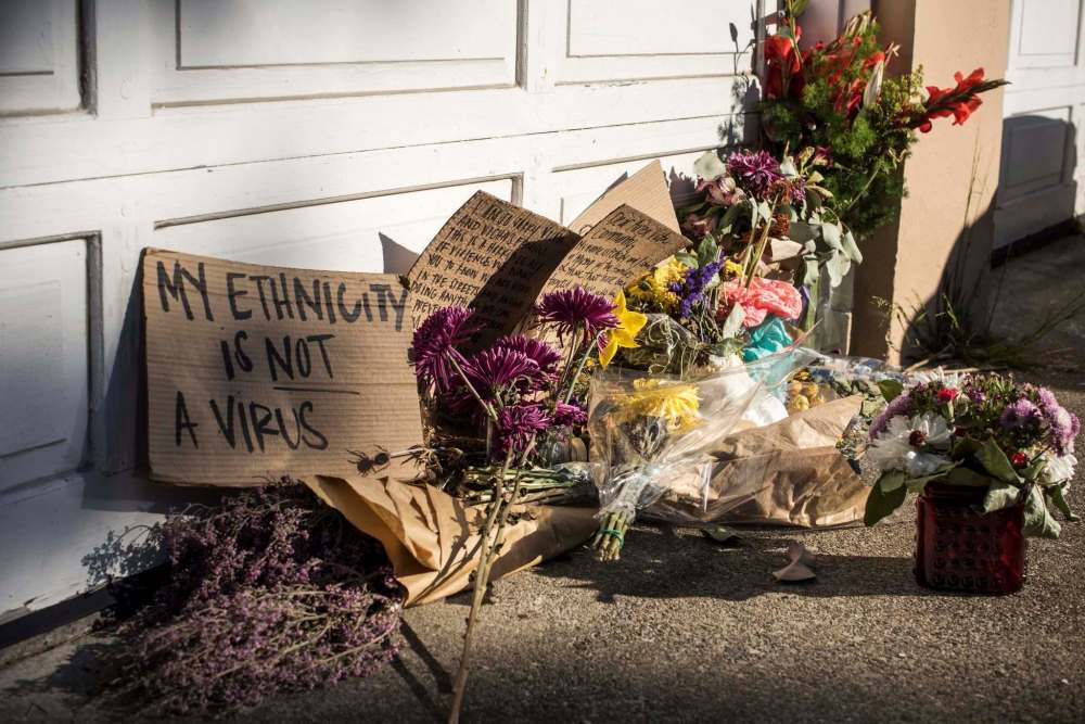 mark leong / The Washington Post
Neighbours and well-wishers have left flowers and signs near where Vicha Ratanapakdee was slammed to the pavement by an attacker, succumbing to the resulting head injury a couple of days later.