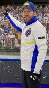 Curling Canada
B.C. curler Jim Cotter pointing to cutout of his dad in the Brier stands.