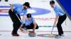 THE CANADIAN PRESS/Jeff McIntosh
Team Quebec skip Michael Fournier, centre, makes a shot as lead Jean-Francois Trepanier, left, and second Felix Asselin sweep at the Brier in Calgary.
