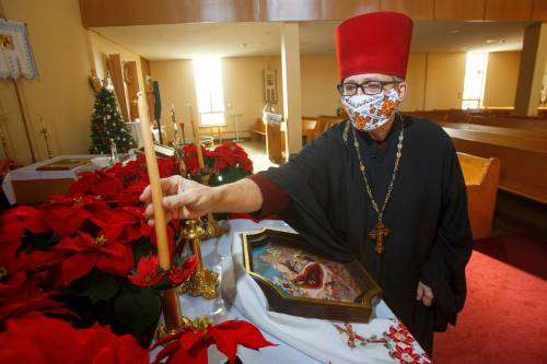 MIKE DEAL / WINNIPEG FREE PRESS 
‘Every family has to make their choice and do what they feel they need to do to keep safe,’ says Rev. Eugene Maximiuk at Holy Trinity Ukrainian Orthodox Metropolitan Cathedral.