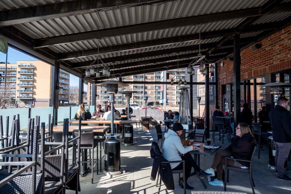 Daniel Crump / Winnipeg Free Press
Saturday marked the first time in over four months that Manitobans from separate households could dine out together — even if it was only outdoors.