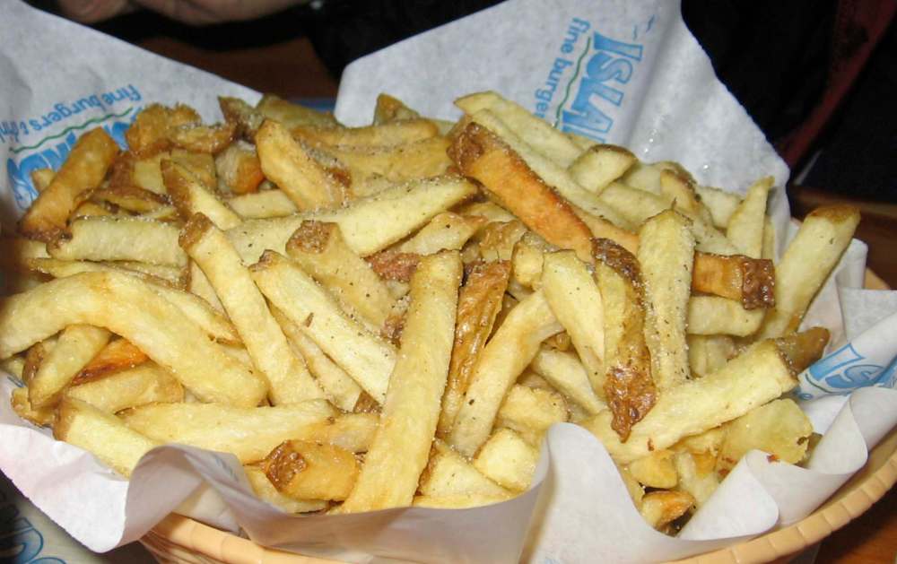 When a craving hits, it's often better to fit in the unhealthy foods, albeit in smaller amounts. (iStock)