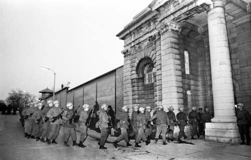 Peter Bregg / The Canadian Press files
Canadian Armed Forces troops arrive at the Kingston penitentiary on April 15, 1971, to help prison officials after inmates took control of the main cell block. The riot ended three days later and left two inmates dead.