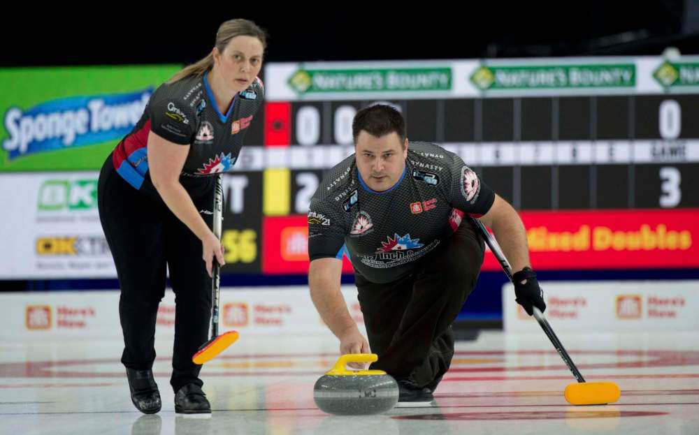 Not only are Kim and Wayne Tuck competing in the Canadian mixed doubles curling championship, their company supplied the curling stones for the tournament. (Michael Burns / Curling Canada)