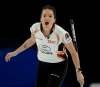 Kerri Einarson shouts to her teammate Brad Gushue during Canadian Mixed Doubles Curling Championship play against Team Alberta in Calgary, Tuesday. THE CANADIAN PRESS/HO - Curling Canada, Michael Burns, *MANDATORY CREDIT*