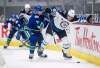 Vancouver Canucks' Travis Hamonic checks Winnipeg Jets' Andrew Copp during the third period in Vancouver, on Wednesday. Copp had a breakout performance with a career-high four goals in the game but despite the success, the 26-year-old says he has 
