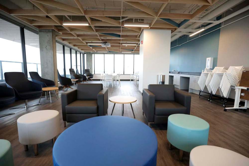The common area is open to residents and includes a kitchen, lounge and outdoor terrace. (Ruth Bonneville / Winnipeg Free Press)