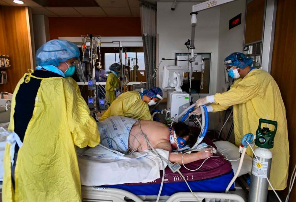 Intensive Care Unit nurses have to care for people and cope with deaths, while carrying an unprecedented workload to monitor surges of other extremely ill patients. THE CANADIAN PRESS FILES/Nathan Denette