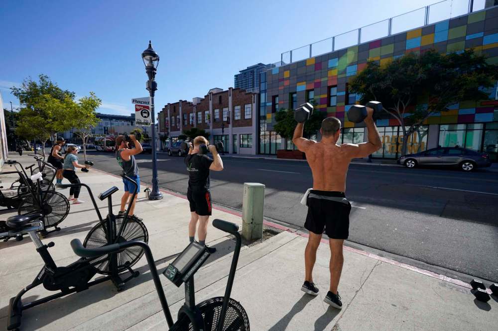 Gregory Bull / The Associated Press Files
Weight training burns fewer calories than cardio, but it does help build and maintain muscle.