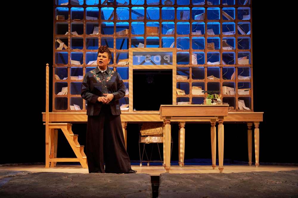 Krystle Pederson in The (Post) Mistress. Set Designer Andrew Moro, Costume Designer Andréanne Dandeneau, Lighting Designer Larry Isacoff, Photo by Hugh Conacher.