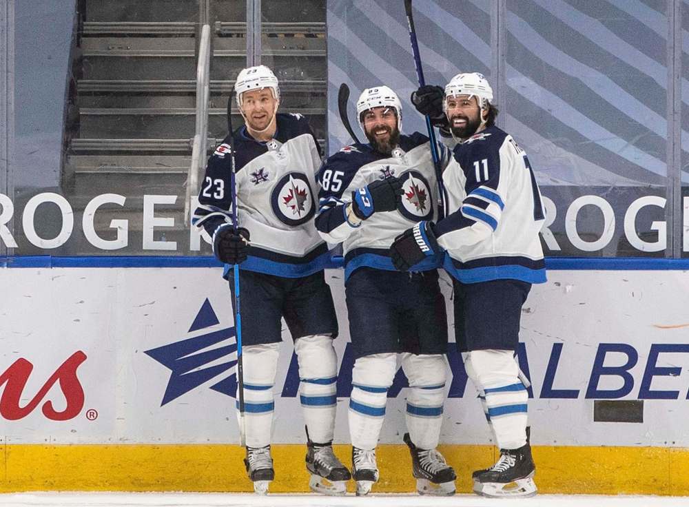 The fourth line of Trevor Lewis, Mathieu Perreault and Nate Thompson is giving coach Paul Maurice the kind of luxury he’s never had before. (Jason Franson / The Canadian Press files)