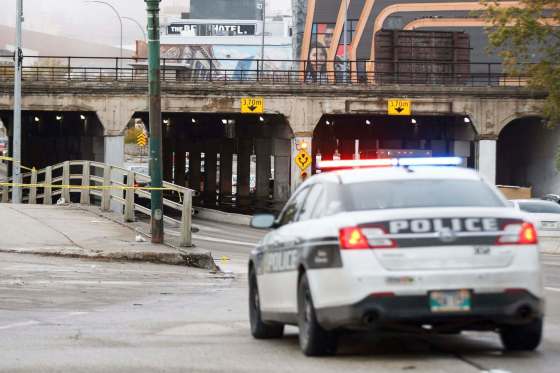 MIKE DEAL / WINNIPEG FREE PRESS FILESPolice investigate after a pedestrian was killed on Main Street at the Higgins underpass just south of Sutherland Avenue in 2019.