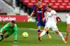 Real Madrid's Luka Modric scores during a Spanish La Liga soccer match between FC Barcelona and Real Madrid last October. The two sides collide again in La Liga's El Clasico Saturday afternoon. (AP Photo/Joan Monfort)
