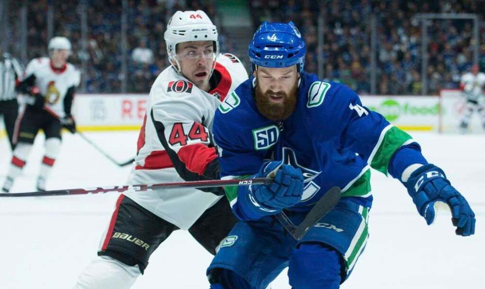 The Vancouver Canucks traded defenceman Jordie Benn, foreground, to the Winnipeg Jets Monday. THE CANADIAN PRESS FILES/Jonathan Hayward