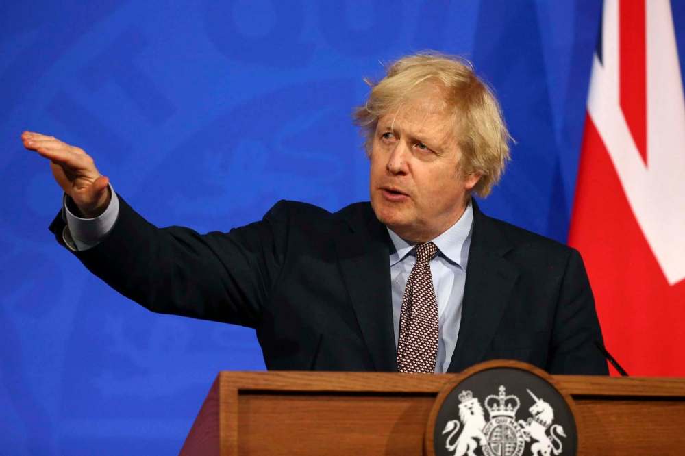 Hollie Adams/Pool via AP
British Prime Minister Boris Johnson's apparently two-pronged Brexit plan has strained relations and frayed ties within the United Kingdom.