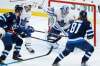 The Winnipeg Jets have just four wins in a dozen games against the first-place Toronto Maple Leafs and third-place Edmonton Oilers. THE CANADIAN PRESS/John Woods