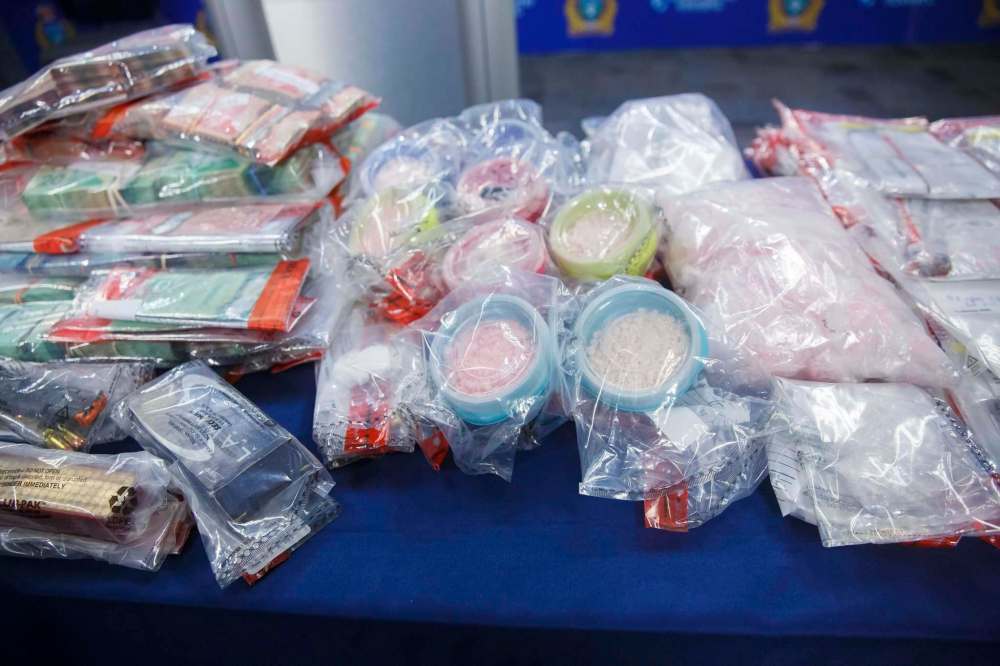 Police arrested 26 people and laid more than 100 criminal charges against 14 people. Investigators seized drugs, a loaded firearm and ammunition, jewelry, a 2016 BMW X5 and a skid steer. (Mike Deal / Winnipeg Free Press)