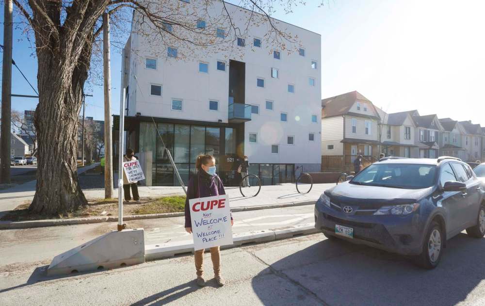 Flora Aruna, who has worked for Welcome Place for 19 years, is one of the Welcome Place employees locked out Tuesday morning. (Mike Deal / Winnipeg Free Press)