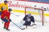 MIKE DEAL / WINNIPEG FREE PRESS
Jets goalie Connor Hellebuyck makes a save Tuesday at practice. Hellebuyck's teammates are not pointing the finger at their world-class goalie for the club's recent slide.