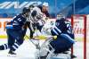 John Woods / The Canadian Press
Jets goaltender Connor Hellebuyck saves the shot from the Oilers' Connor McDavid Wednesday night. More than 26 per cent of McDavid's points this year have come against the Jets.