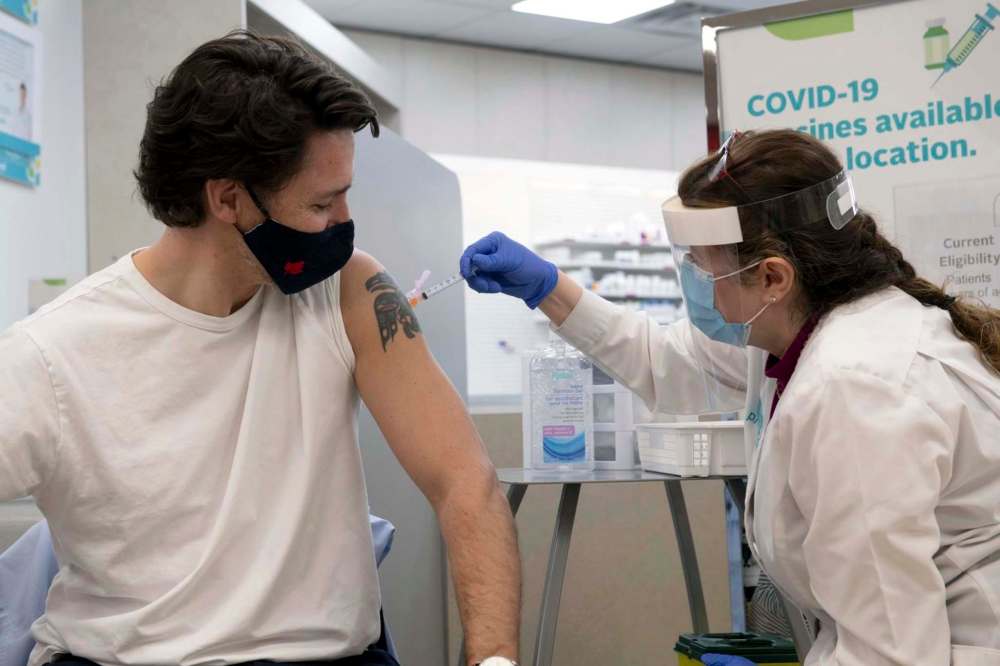 Adrian Wyld
/ The Canadian Press
Prime Minister Justin Trudeau receives his COVID-19 AstraZeneca vaccination in Ottawa on April 23.