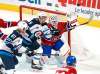 Montreal Canadiens goaltender Jake Allen gloves the puck away from Winnipeg Jets' Andrew Copp, centre, and Kyle Connor during the third period in Montreal on Friday. THE CANADIAN PRESS/Paul Chiasson