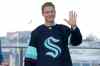 CP
Jamie Oleksiak, a defenseman from the Dallas Stars, is introduced as a new player with the Seattle Kraken NHL hockey team, Wednesday. (AP Photo/Ted S. Warren)