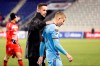 New York City FC head coach Ronny Deila, center, congratulates New York City FC captain and midfielder Alexander Ring, right, after NYC FC defeated San Carlos 1-0 in a CONCACAF Champions League round of 16 soccer match, Wednesday, Feb. 26, 2020, in Harrison, N.J. A San Carlos player leaves the field at left. (AP Photo/Kathy Willens)