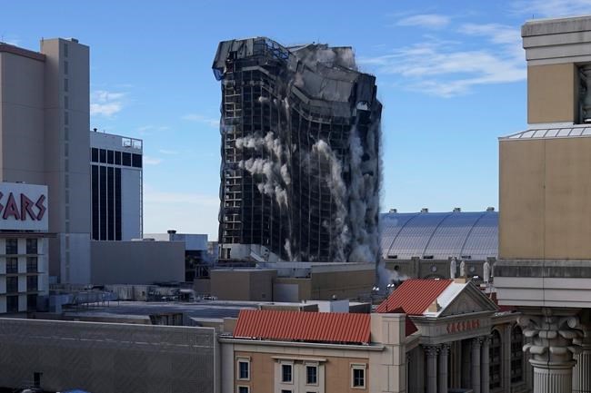 The former Trump Plaza casino is imploded on Wednesday, Feb. 17, 2021, in Atlantic City, N.J. After falling into disrepair, the one-time jewel of former President Donald Trump's casino empire is reduced to rubble, clearing the way for a prime development opportunity on the middle of the Boardwalk, where the Plaza used to market itself as