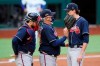 Atlanta Braves manager Brian Snitker talks with starting pitcher Max Fried during the first inning in Game 6 of a baseball National League Championship Series against the Los Angeles Dodgers Saturday, Oct. 17, 2020, in Arlington, Texas. (AP Photo/Eric Gay)