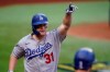 Los Angeles Dodgers' Joc Pederson celebrates a three-run home run during the first inning in Game 3 of a baseball National League Championship Series against the Atlanta Braves Wednesday, Oct. 14, 2020, in Arlington, Texas. (AP Photo/Eric Gay)