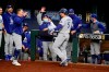 Los Angeles Dodgers' Corey Seager celebrates his two-run home run against the Atlanta Braves during the seventh inning in Game 5 of a baseball National League Championship Series Friday, Oct. 16, 2020, in Arlington, Texas. (AP Photo/Tony Gutierrez)