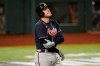 Atlanta Braves' Freddie Freeman holds his arm after getting hit by a pitch against the Los Angeles Dodgers during the eighth inning in Game 2 of a baseball National League Championship Series Tuesday, Oct. 13, 2020, in Arlington, Texas. (AP Photo/Eric Gay)