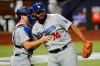 Los Angeles Dodgers relief pitcher Kenley Jansen and catcher Will Smith celebrate their win against the Atlanta Braves in Game 5 of a baseball National League Championship Series Friday, Oct. 16, 2020, in Arlington, Texas. (AP Photo/Eric Gay)