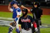 Atlanta Braves' Marcell Ozuna walks to the dugout after striking out during the sixth inning in Game 7 of a baseball National League Championship Series against the Los Angeles Dodgers Sunday, Oct. 18, 2020, in Arlington, Texas. (AP Photo/Tony Gutierrez)