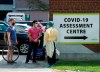 People line up to be tested at a COVID-19 assessment centre in Toronto on Tuesday, May 26, 2020. THE CANADIAN PRESS/Nathan Denette