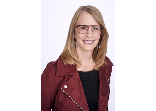 FILE - This undated file photo provided by NerdWallet shows Liz Weston, a columnist for personal finance website NerdWallet.com. When stock markets are rattled by news events, it’s unsettling for any investor — but especially so for those who are retired (or nearly there). The first thing anyone with an investment portfolio should do is make sure it’s properly balanced, taking both income needs and risk tolerance into account. (NerdWallet via AP, File)