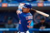 FILE - In this Feb. 22, 2020, file photo, New York Mets' Michael Conforto bats during a spring training baseball game against the Miami Marlins in Port St. Lucie, Fla. Mets outfielder Michael Conforto was scheduled to be examined by a doctor in New York after tweaking his side while making a catch in a recent spring training game. The slugger had an MRI in Florida but left camp and was sent to New York on Monday night, March 9, 2020, to meet with the team's medical director, Dr. David Altchek, for further evaluation, the Mets said.(AP Photo/Vera Nieuwenhuis, File)