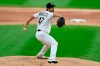 FILE - Chicago White Sox starter Gio Gonzalez delivers a pitch during the first inning of a baseball game against the Detroit Tigers in Chicago, in this Monday, Aug. 17, 2020, file photo. Veteran left-hander Gio Gonzalez agreed to terms on a minor league contract with the Miami Marlins and will take part in their major league camp.(AP Photo/Paul Beaty, File)