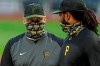 FILE - In this Tuesday, July 7, 2020, file photo, Pittsburgh Pirates first baseman Josh Bell, right, listens to manager Derek Shelton during a team workout at PNC Park in Pittsburgh. Shelton and other first-year managers are scrambling to make up for lost time. The rookie skippers are getting creative when it comes to getting a feel for their players during a season unlike any other. (AP Photo/Gene J. Puskar, File)