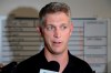 FILE - In this Aug. 1, 2019, file photo, Baltimore Orioles general manager Mike Elias talks to reporters prior to a baseball game against the Toronto Blue Jays, in Baltimore. Hundreds of young baseball players who would usually be celebrating being drafted by major league teams are now in limbo after the Major League Baseball draft was shortened from 40 rounds to five because of the coronavirus pandemic. 